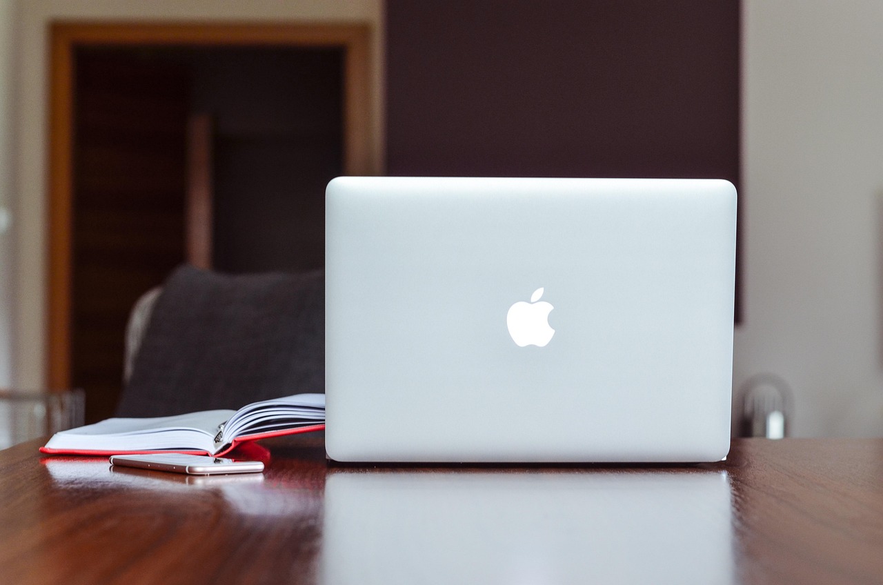 Apple, macbook, notebook — Enhancing Real Estate Strategies with Advanced Site Selection Software