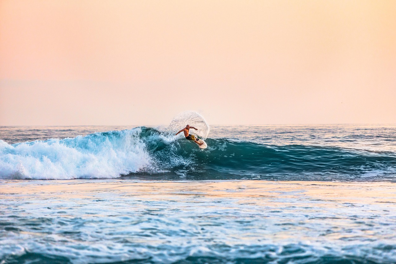Surfer, beach, man — Friendly Match Alert: Qatar vs. Russia Football Score Highlights!