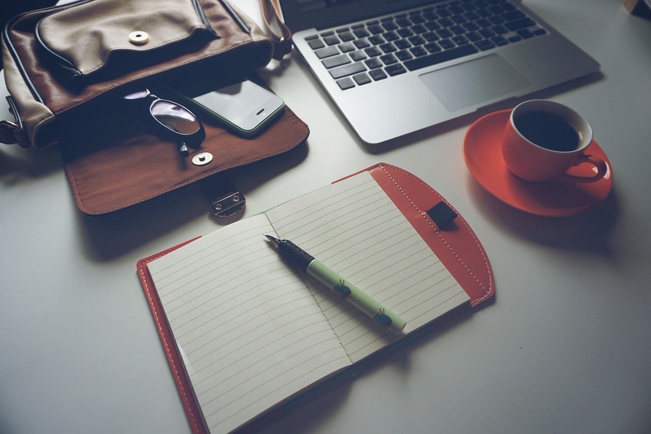 Laptop, coffee, notebook — "The Role of the FHIR Terminology Browser in Modern Healthcare Integration"