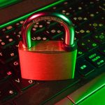 A padlock resting on a keyboard, symbolizing security in online practices.